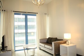 Quarto standard | Sala de estar | TV de tela plana