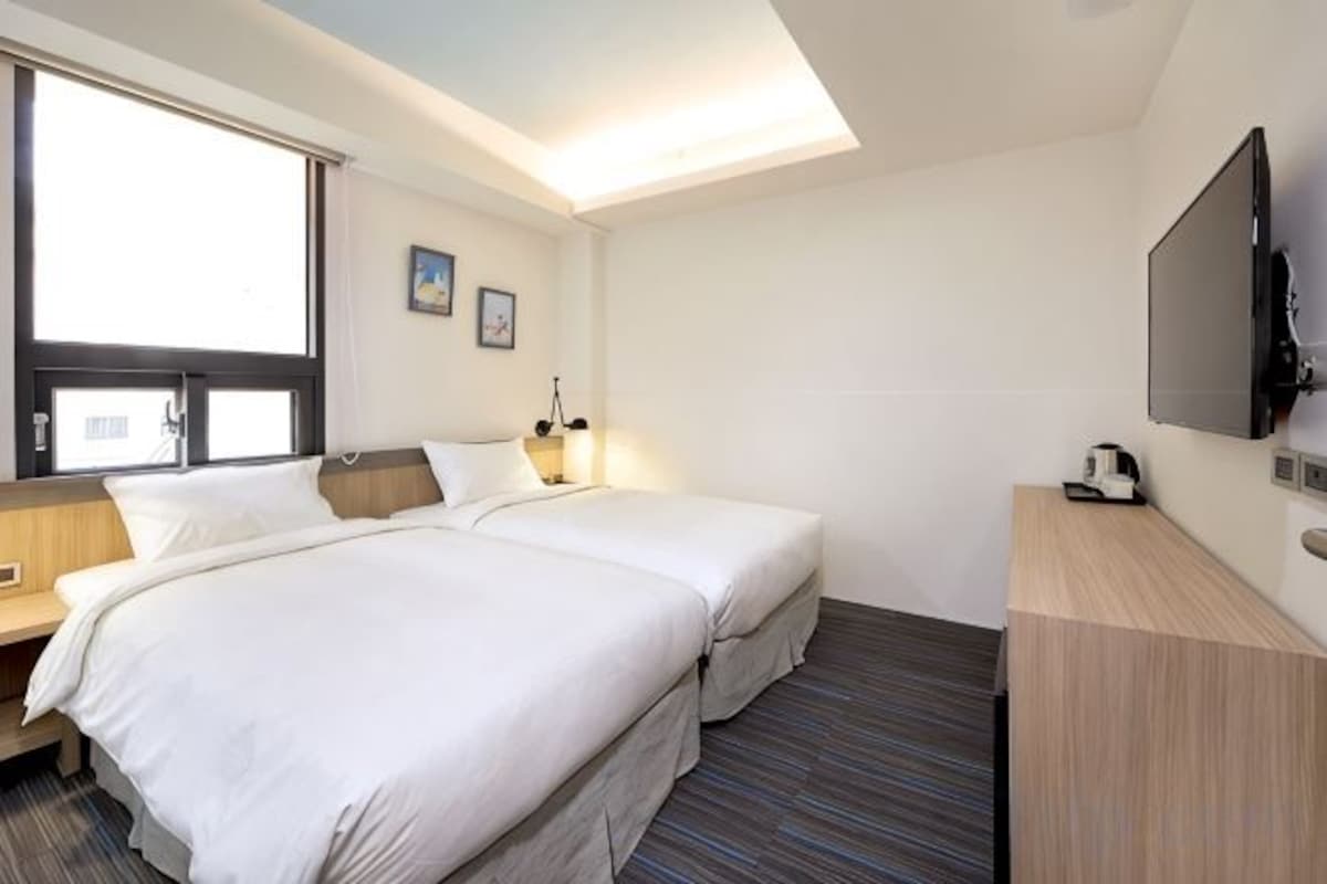 Desk, blackout drapes, rollaway beds (surcharge), WiFi (free)