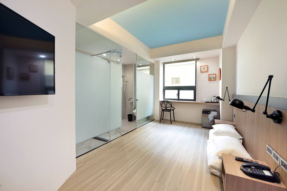 Desk, blackout drapes, rollaway beds, free WiFi