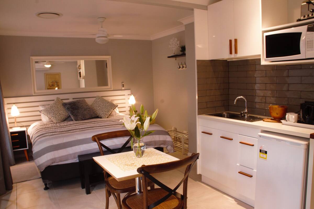 Room 2 King | Premium bedding, desk, soundproofing, iron/ironing board