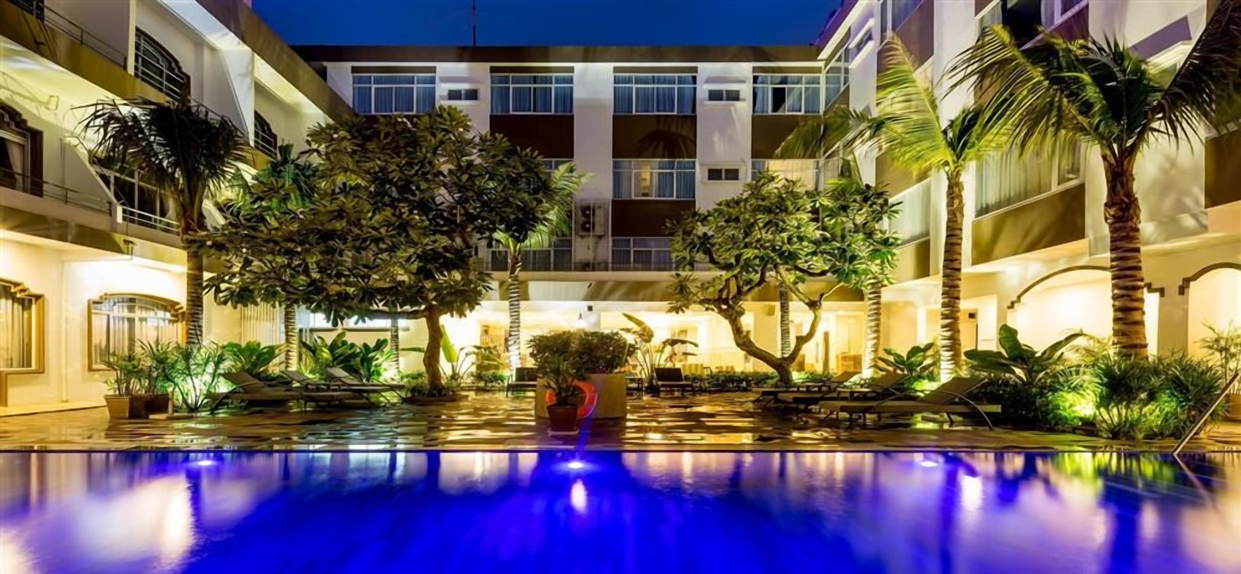 outdoor pool, pool umbrellas, pool loungers