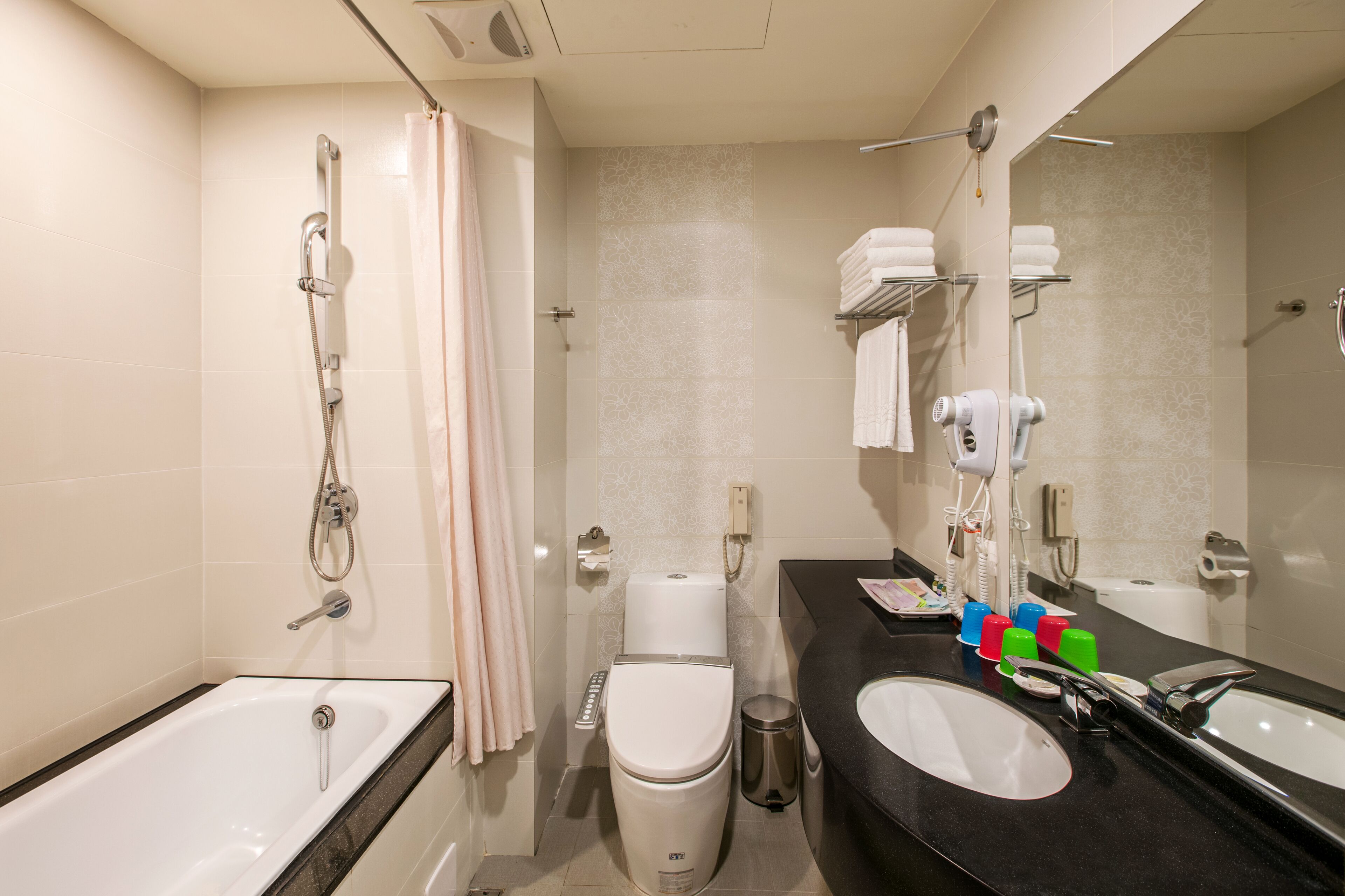 classic triple room, 3 single beds | bathroom | hair dryer, slippers, bidet, towels