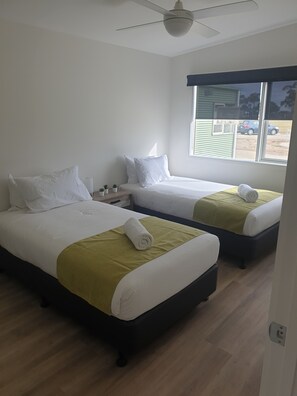 Two-Bedroom Suite | Minibar, blackout drapes, soundproofing, iron/ironing board