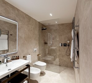 Shower, designer toiletries, hair dryer, bathrobes