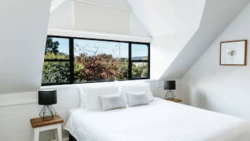 King Balcony Suite | Premium bedding, desk, laptop workspace, iron/ironing board