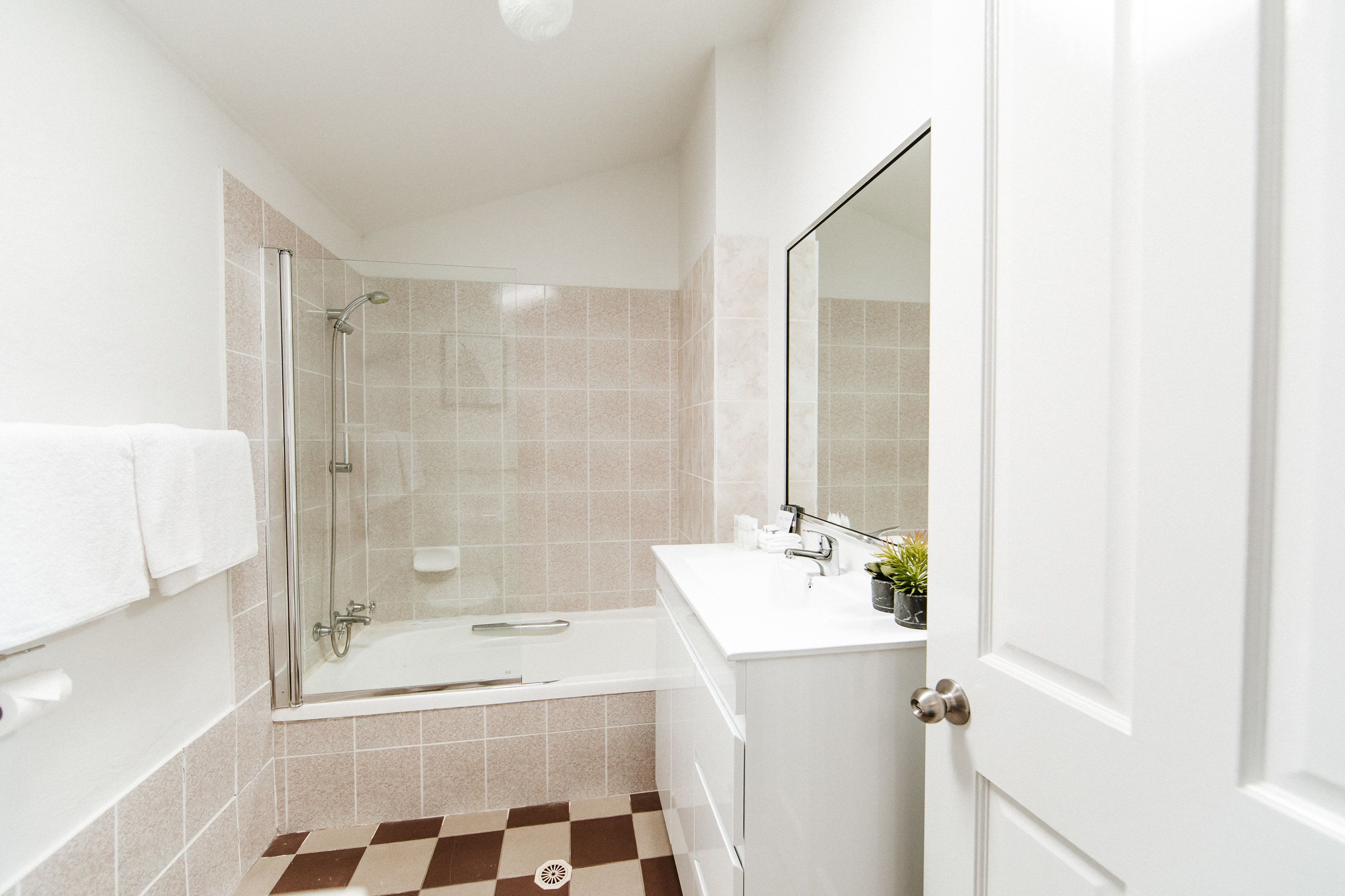 one or two bedroom king suite | bathroom | free toiletries, hair dryer, towels