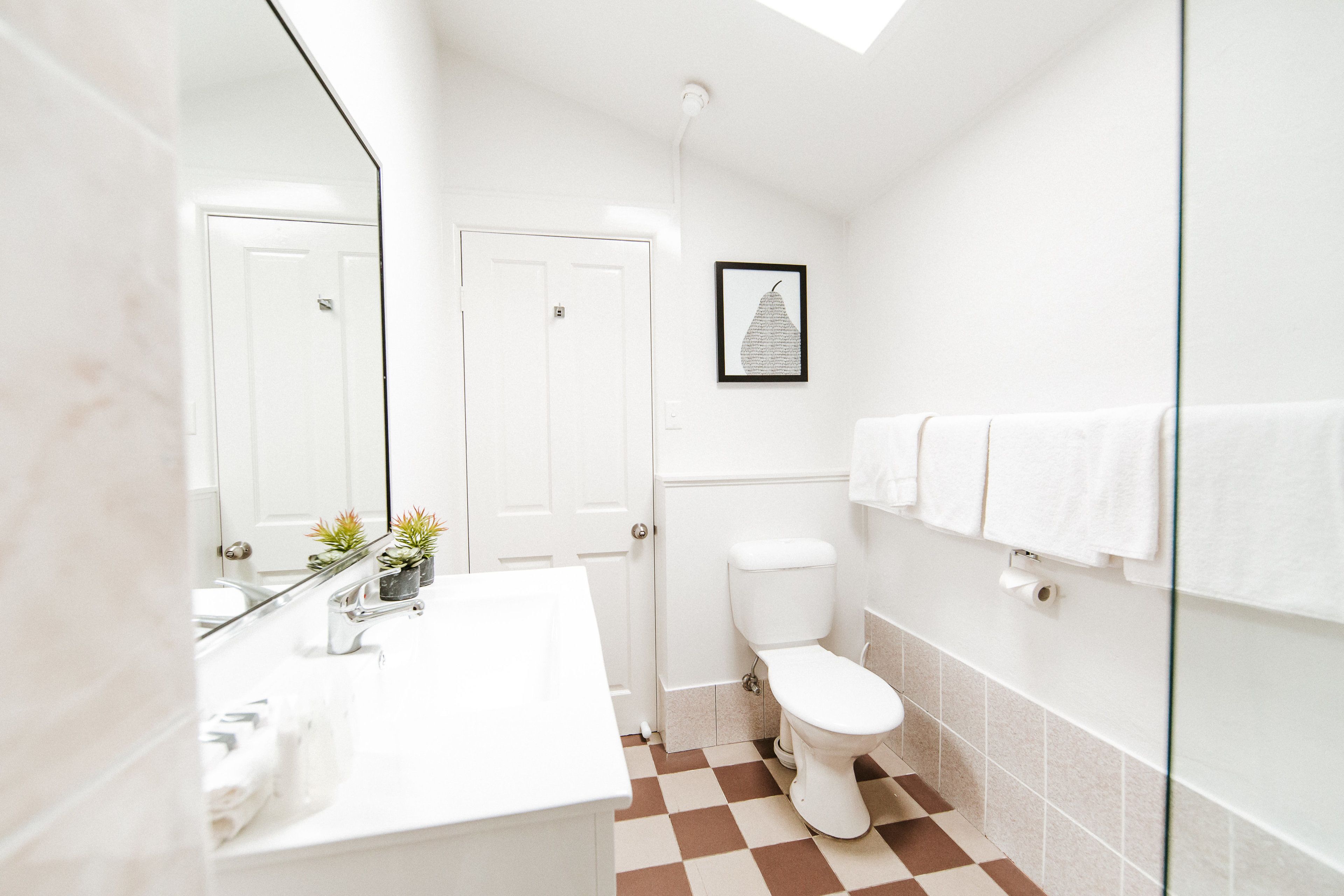 one or two bedroom king suite | bathroom | free toiletries, hair dryer, towels