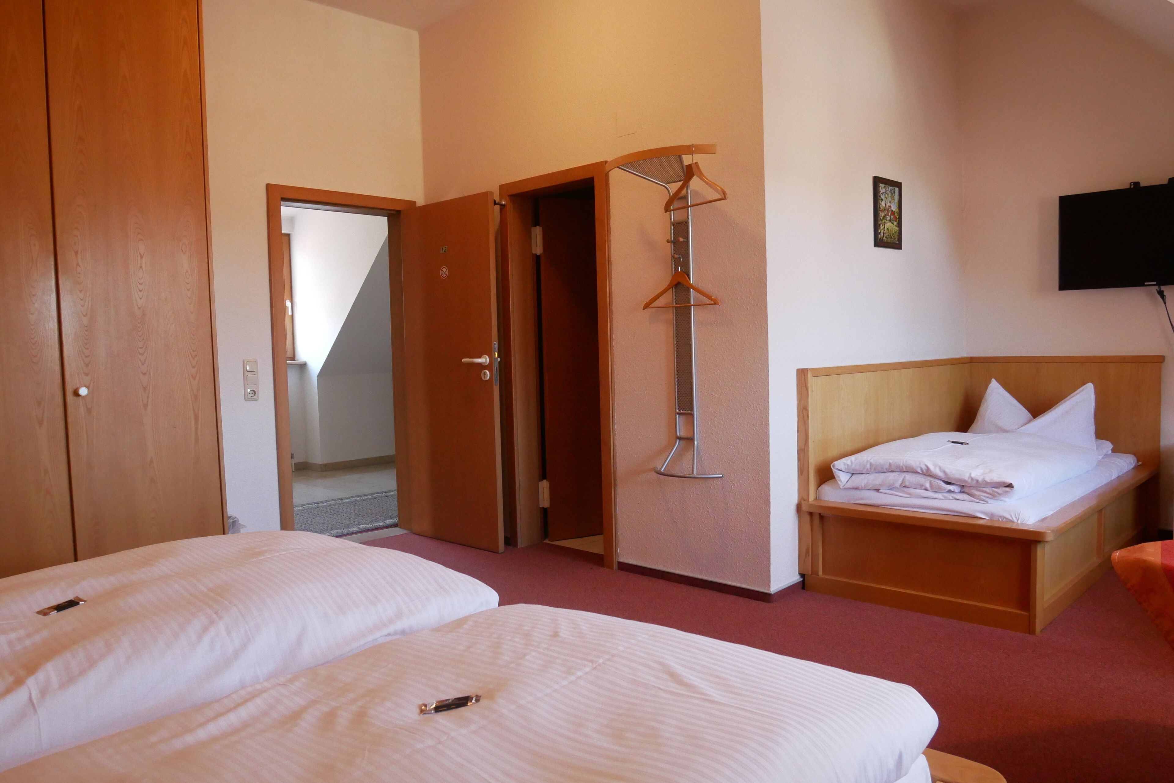 quadruple room | premium bedding, desk, iron/ironing board, free cots/infant beds