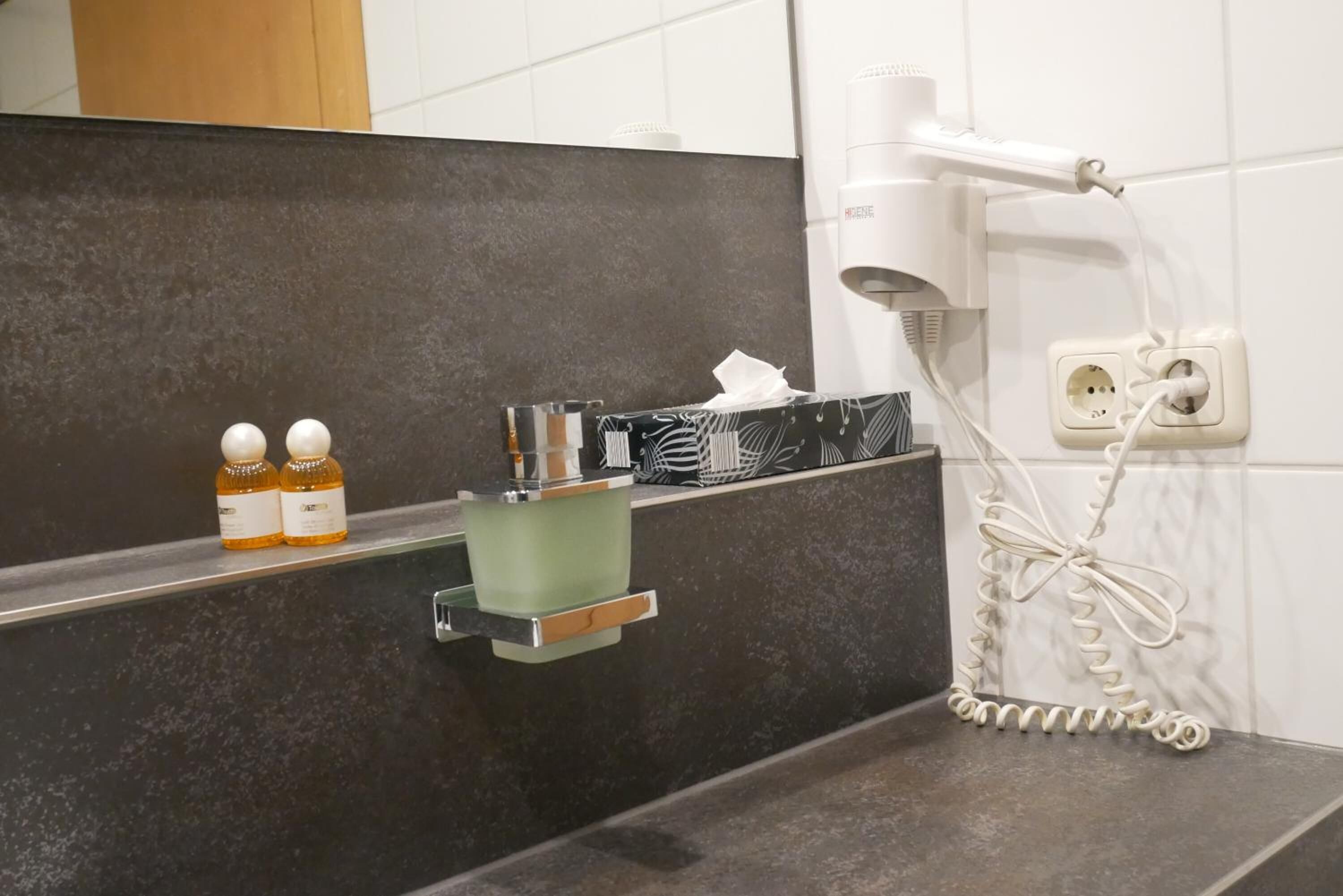 shower, free toiletries, hair dryer, towels