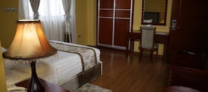 Individually furnished, desk, laptop workspace, blackout drapes - Blue Nest Hotel (Addis Ababa)