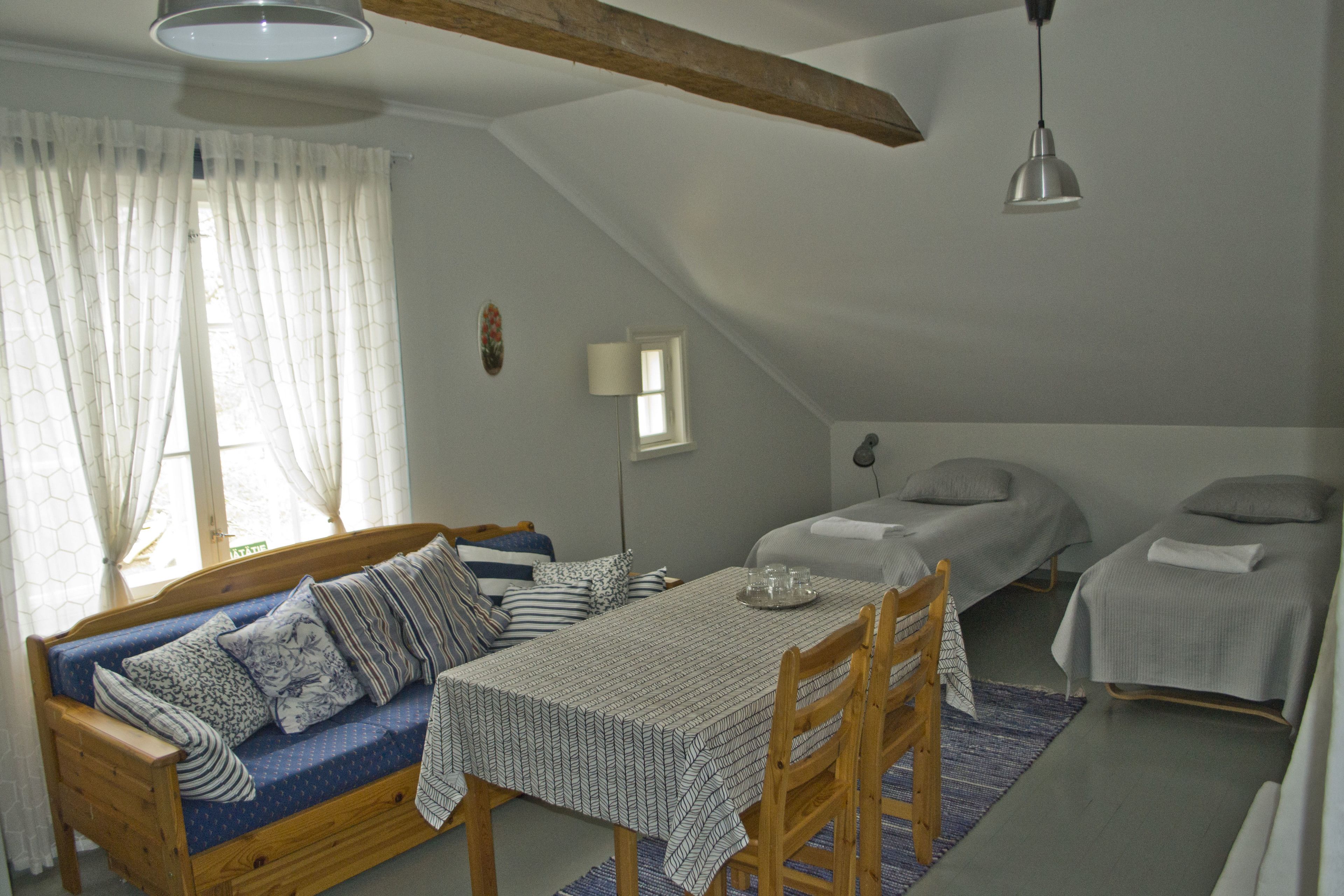 basic quadruple room, shared bathroom, park view | blackout curtains, cots/infant beds, rollaway beds, free wifi