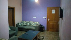Suite, 1 Bedroom | Living area | Flat-screen TV - Wetland Hotels (Ibadan)
