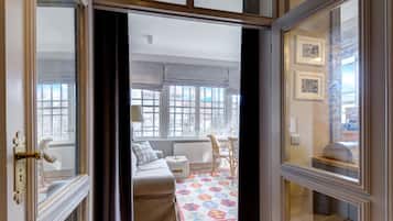 Comfort Apartment, 1 Bedroom, Kitchenette | Living area | 32-inch flat-screen TV with cable channels, TV