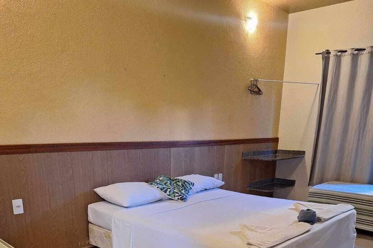 Quarto Standard Quádruplo 1º Andar | Minibar, skrivebord, blendingsgardiner og wi-fi (inkludert)