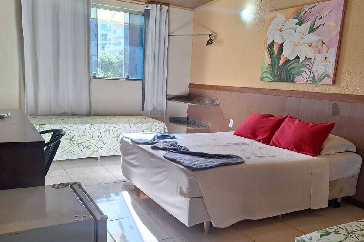Quarto Conforto Quádruplo 2º Andar | Minibar, skrivebord, blendingsgardiner og wi-fi (inkludert)