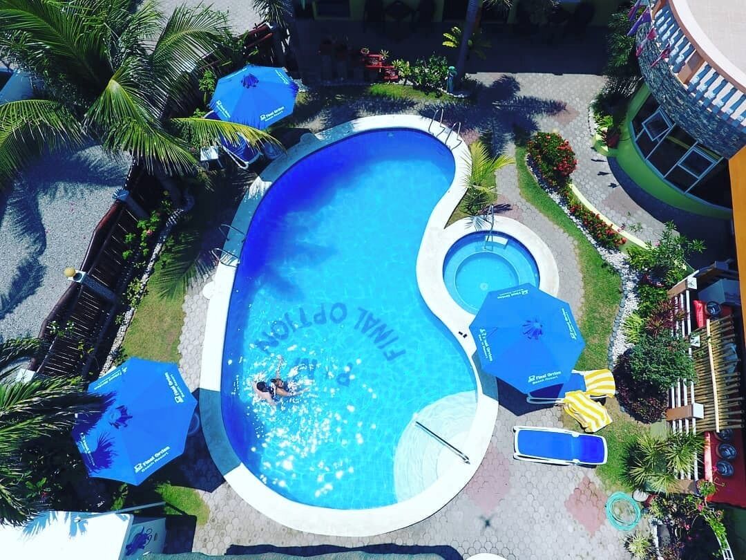 outdoor pool, pool umbrellas, pool loungers