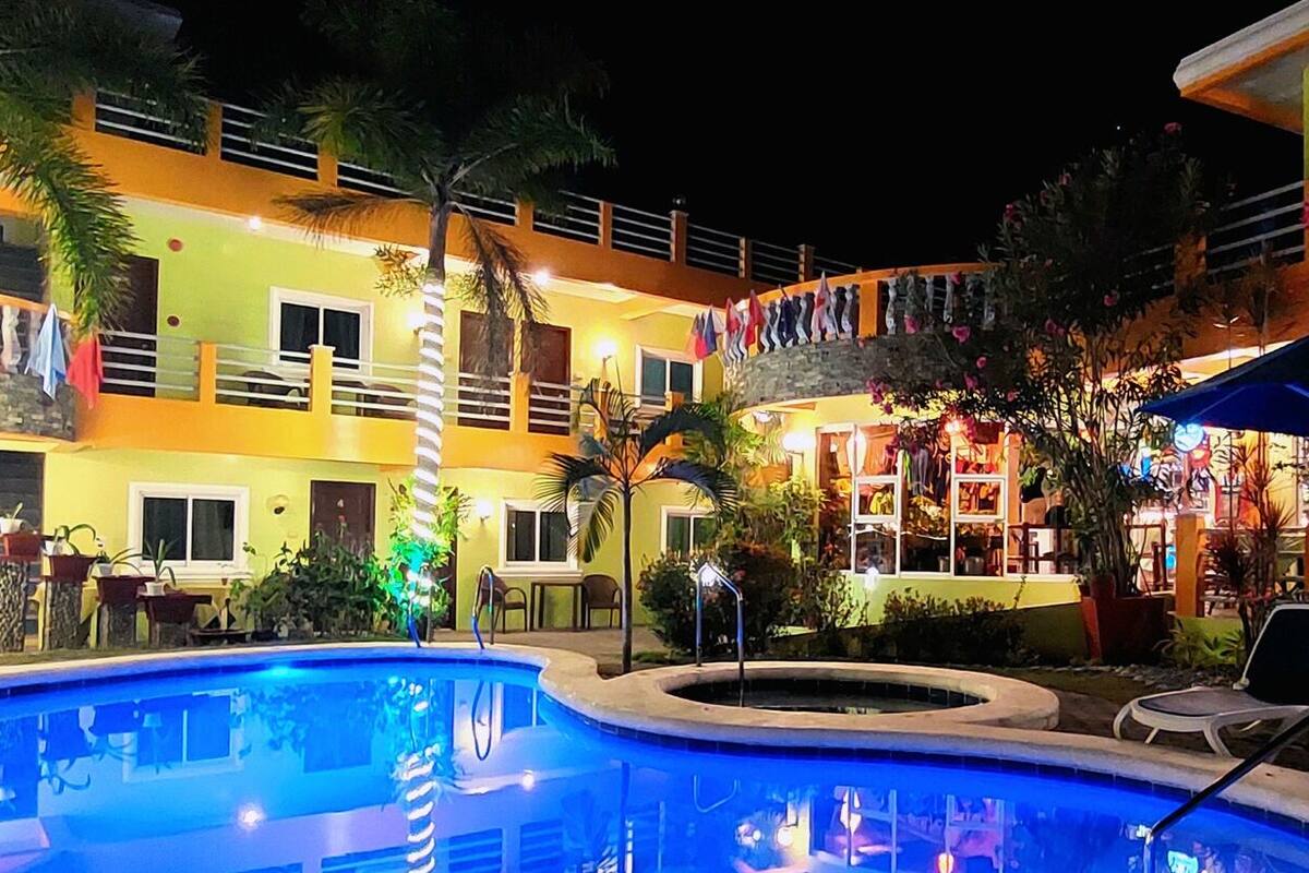 outdoor pool, pool umbrellas, pool loungers