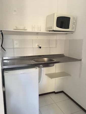 Fridge, microwave, cookware/dishes/utensils