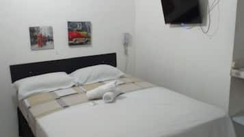 Quarto família | Cortinas blackout, Wi-Fi de cortesia