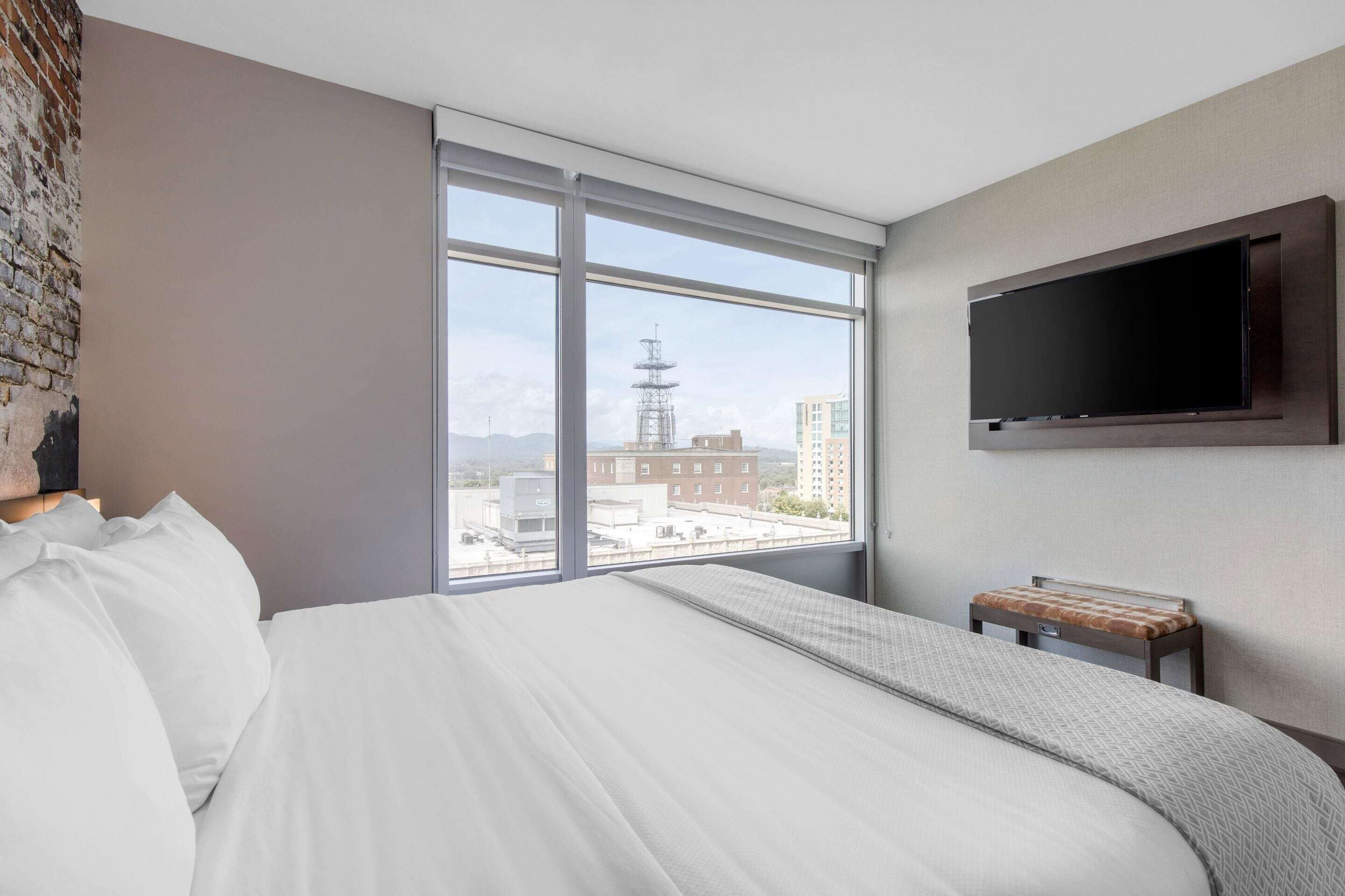 Premium bedding, in-room safe, individually decorated