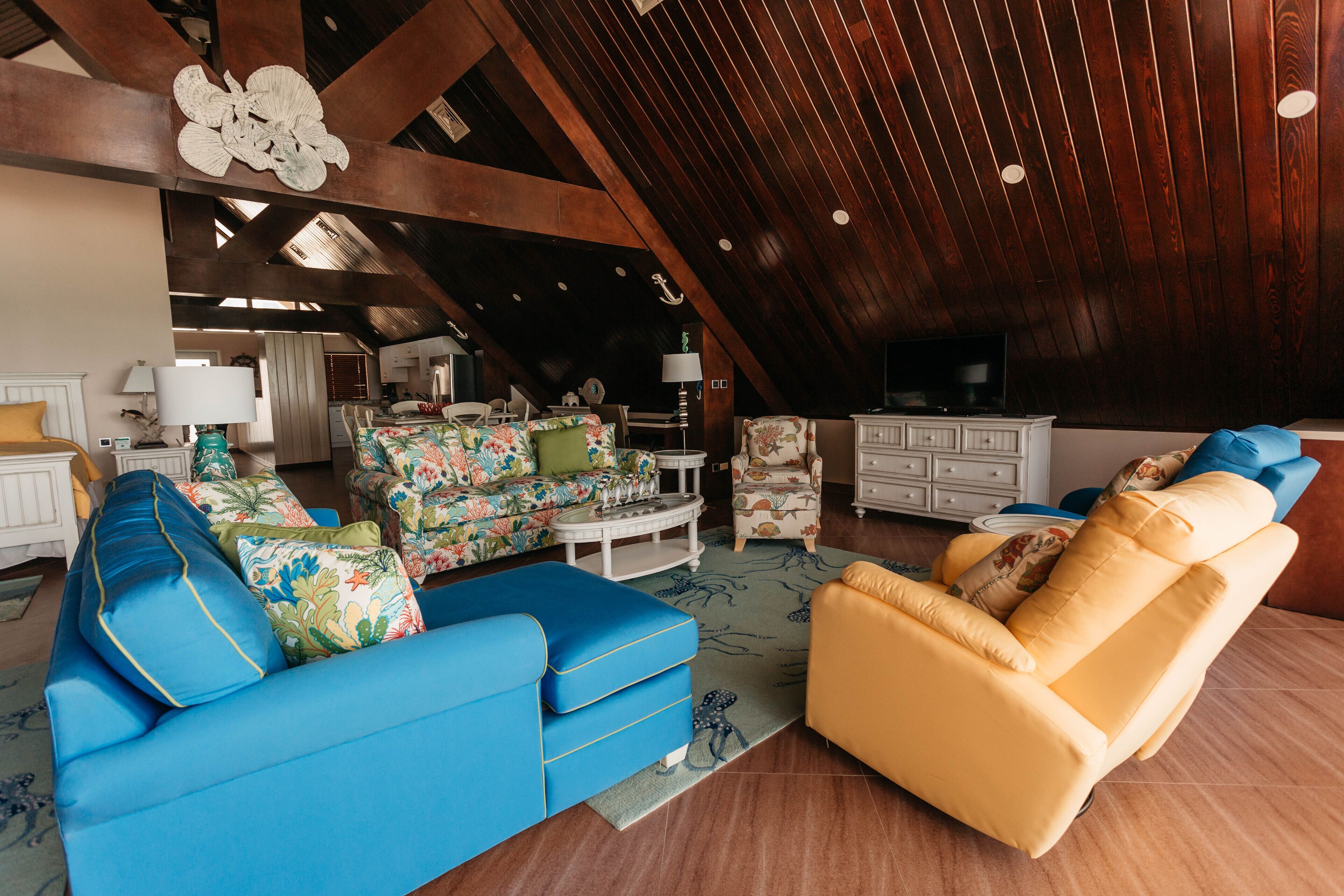 presidential room, multiple beds, non smoking | living room | 45-inch flat-screen tv with cable channels, tv