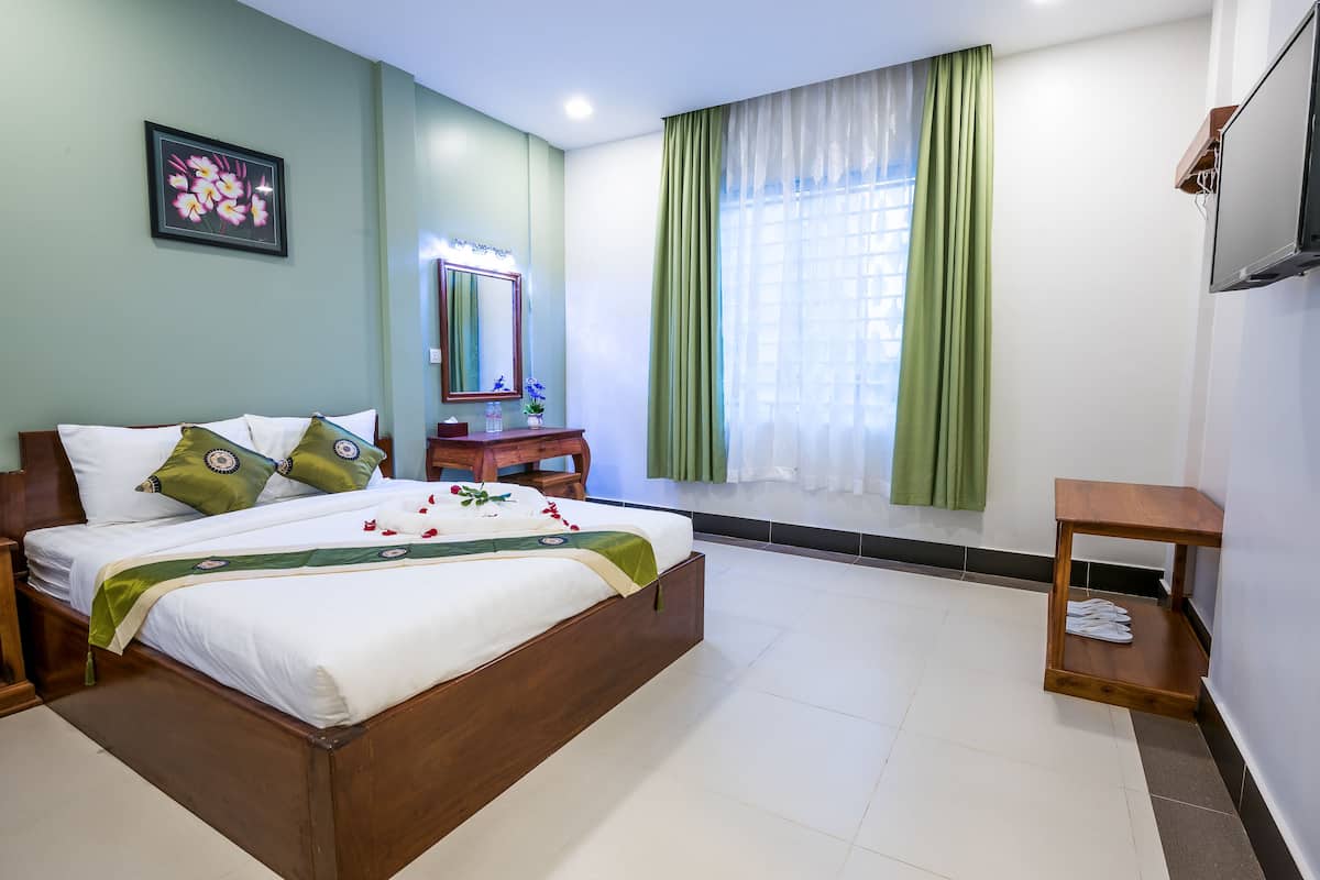Habitación doble Deluxe | Escritorio, wifi gratis y ropa de cama