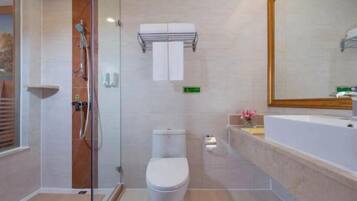 Shower, free toiletries, hair dryer, slippers