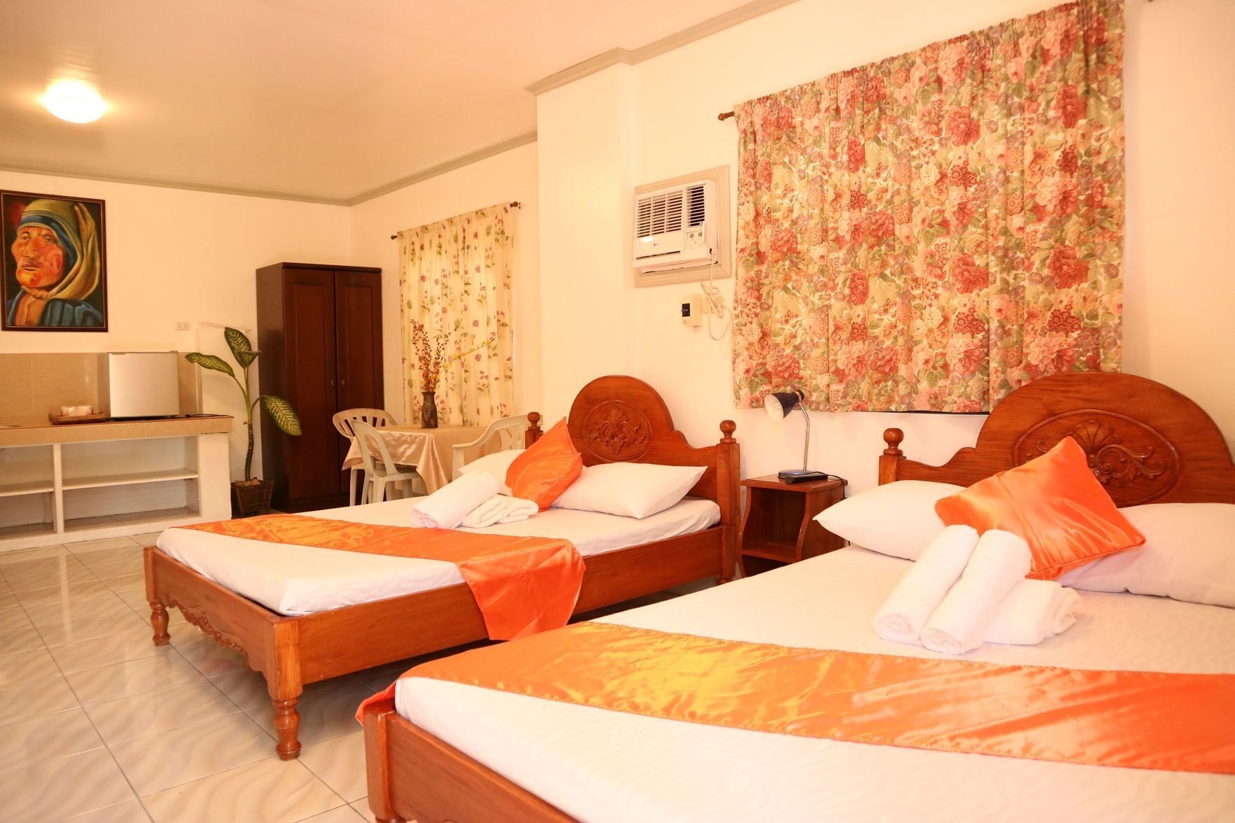 Desk, iron/ironing board, bed sheets