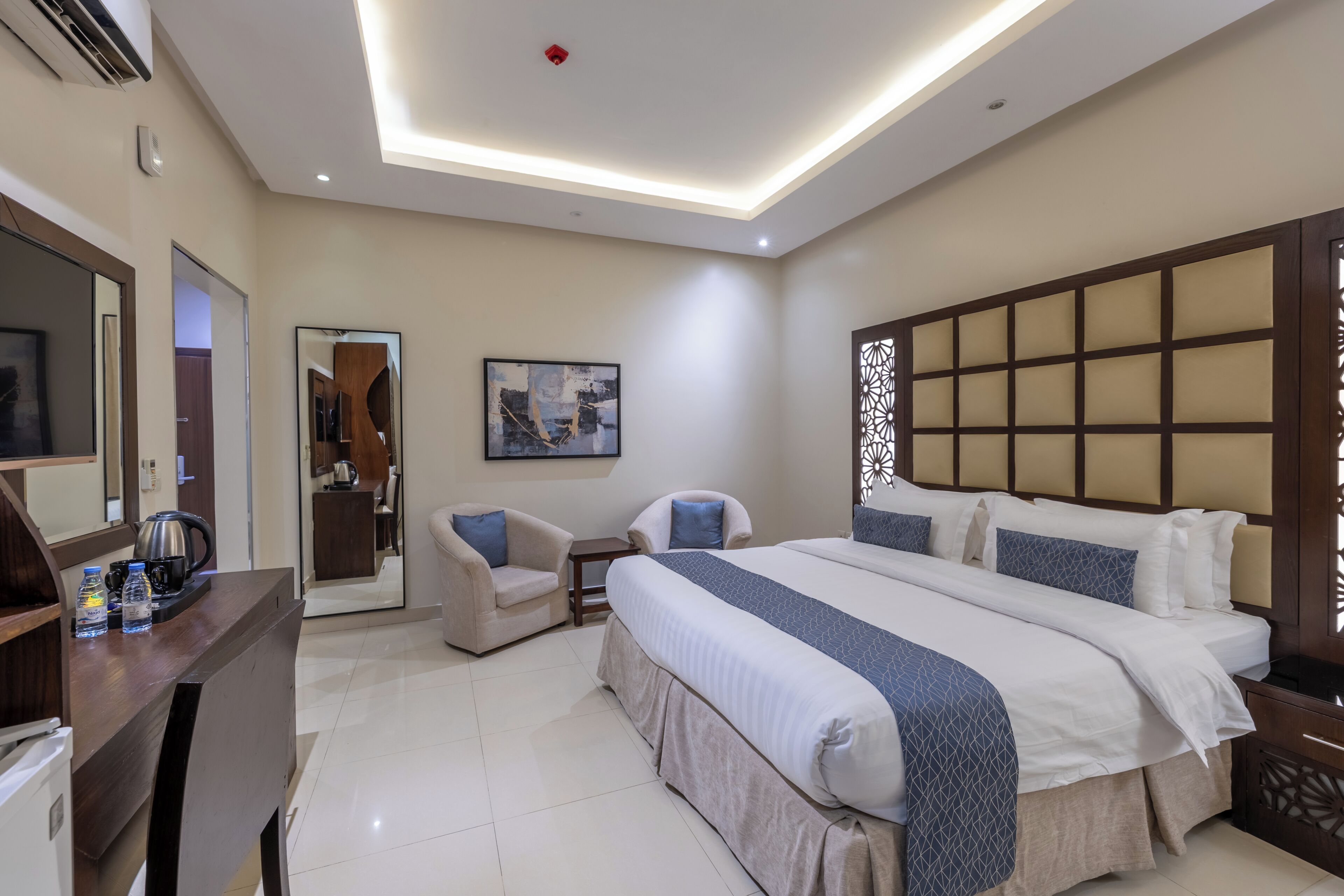 Double Room | Minibar, in-room safe, desk, iron/ironing board