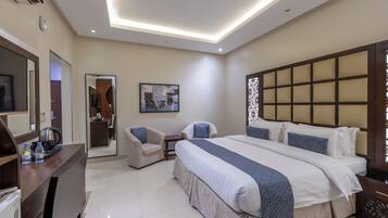 Double Room | Minibar, in-room safe, desk, iron/ironing board