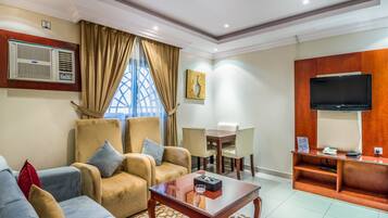 Departamento, 1 habitación | Área de sala de estar | Televisión LCD