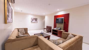 Apartamento, 1 habitación | Sala de estar | Una televisión LCD