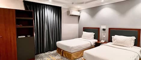 Suite Familiale, 2 chambres, vue ville | 1 chambre, minibar, rideaux occultants, chambres insonorisées