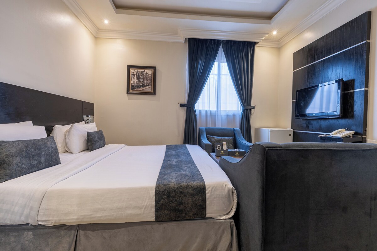 Double Room | Blackout curtains, iron/ironing board (on request), free WiFi