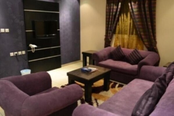 Apartment, 1 Bedroom | Living room | TV