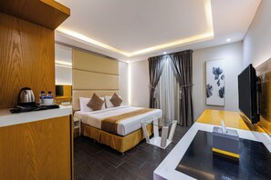 Standard Double Room, 1 King Bed | Blackout curtains, soundproofing, iron/ironing board (on request) - Al Muahidb Residence Al Takhasossi 4 - Economic (Riyadh)