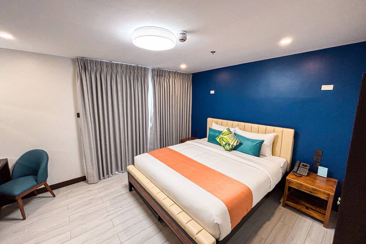 Suite, 2 Schlafzimmer | Zustellbetten, kostenloses WLAN, Bettwäsche
