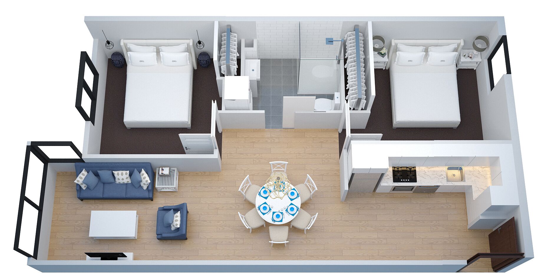 Une chambre d’hôtel comprenant deux lits, un coin salon avec un canapé et une table, ainsi qu’une kitchenette.