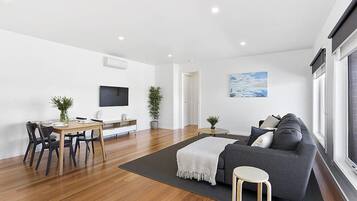 Apartment, 2 Bedrooms | Living area | Flat-screen TV