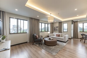 Executive Suite, 2 Bedrooms, Kitchen, City View | Living area | 43-inch flat-screen TV with cable channels, TV, DVD player - Garden View Court Suites Ho Chi Minh City (Ho Chi Minh City)