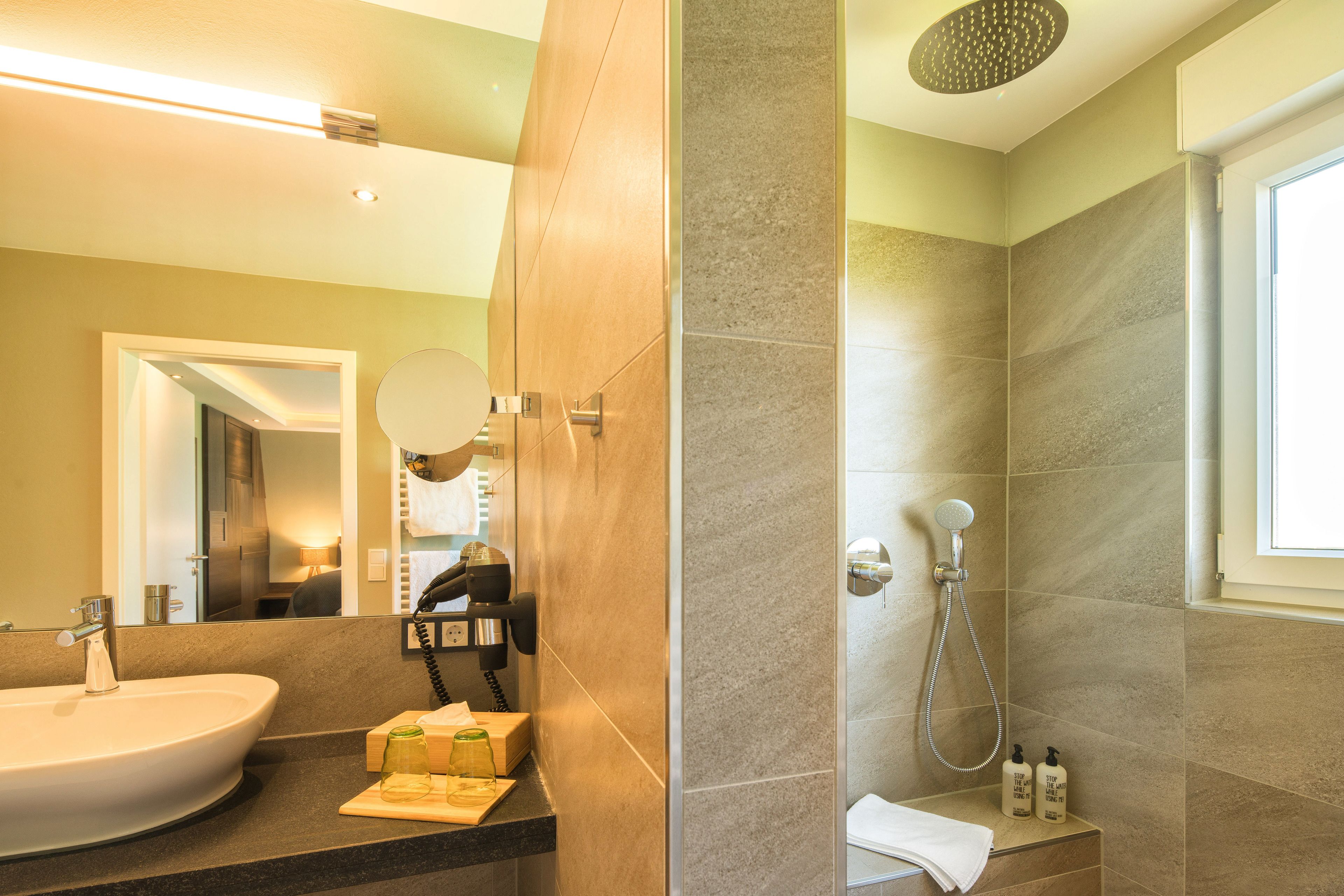 shower, free toiletries, hair dryer, dressing gowns