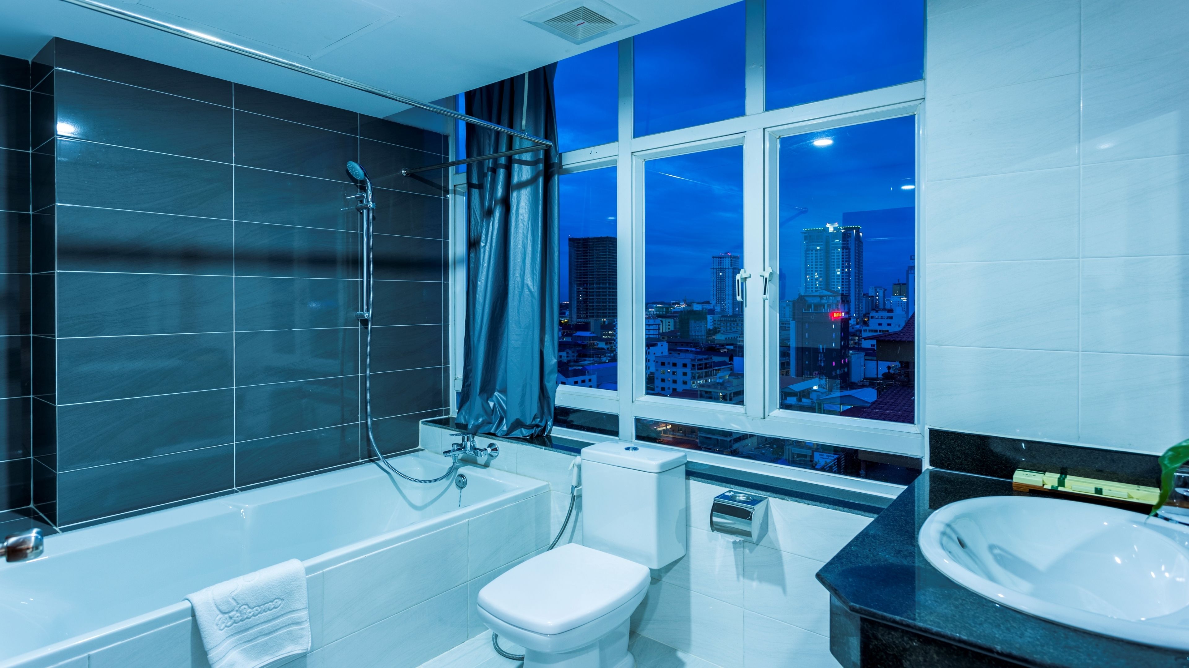 Le Suite | Bathroom | Free toiletries, hair dryer, bathrobes, towels