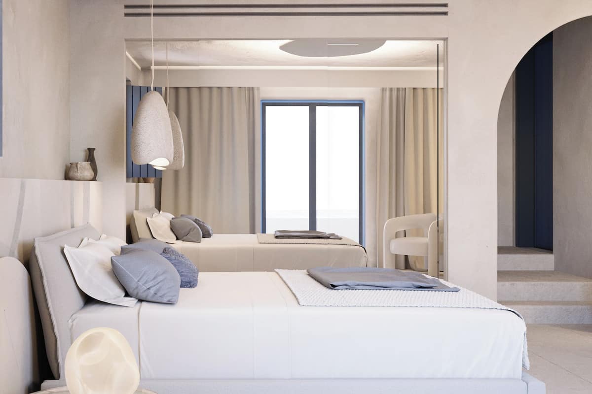 Un dormitorio moderno con una cama grande, una mesita de noche, una silla y una ventana con cortinas.