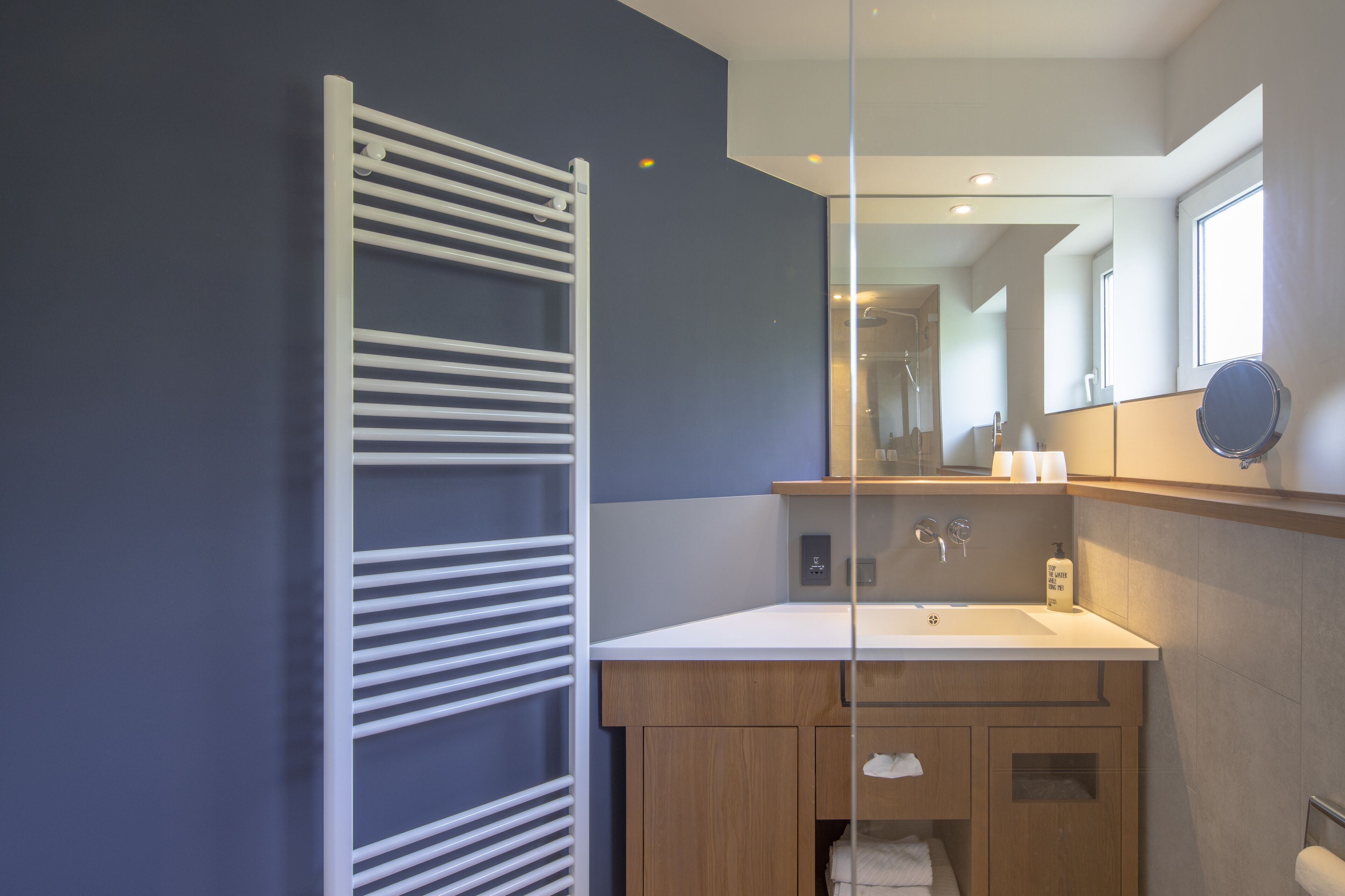 double room, river view | bathroom | eco-friendly toiletries, hair dryer, towels