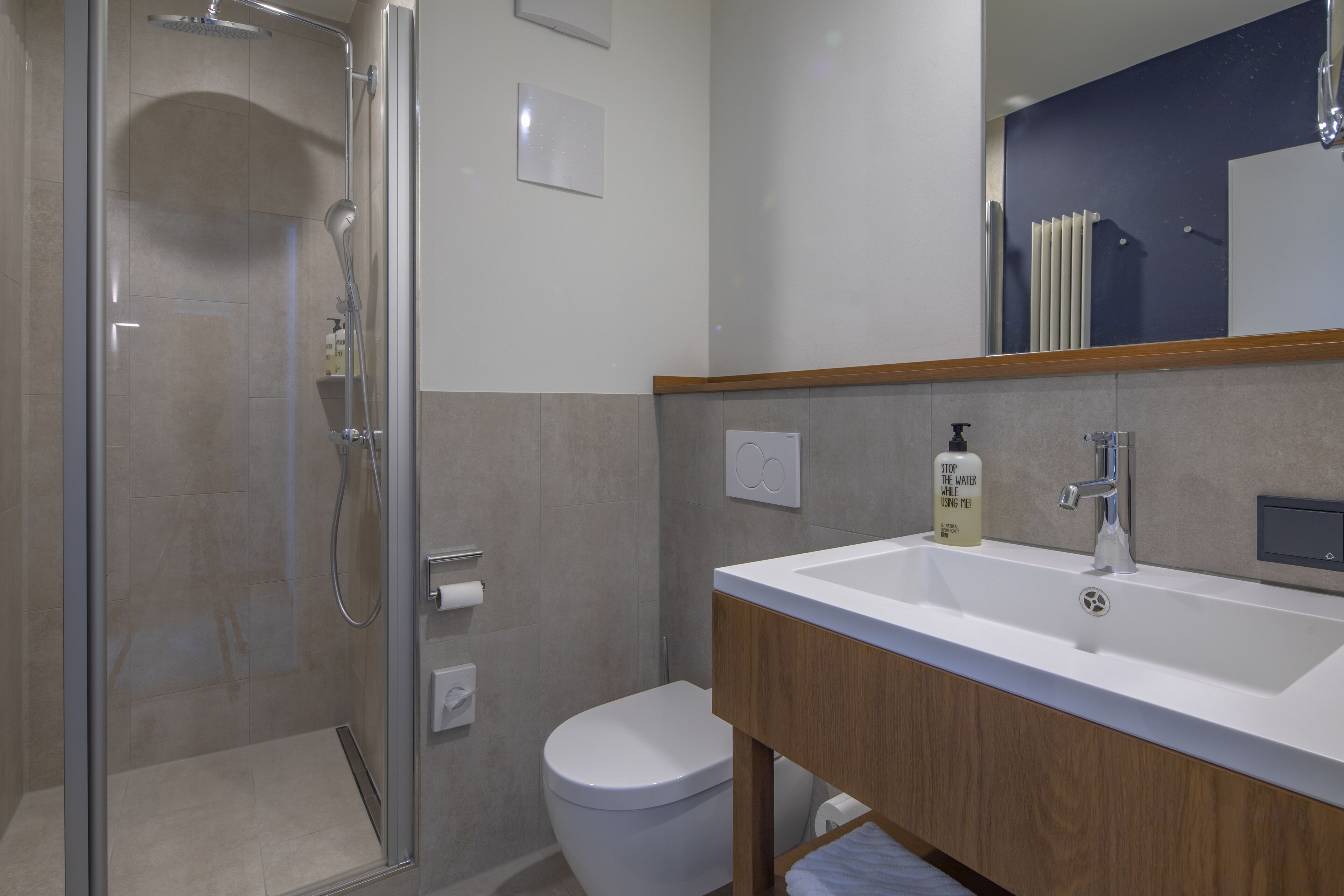 double room, river view | bathroom | eco-friendly toiletries, hair dryer, towels