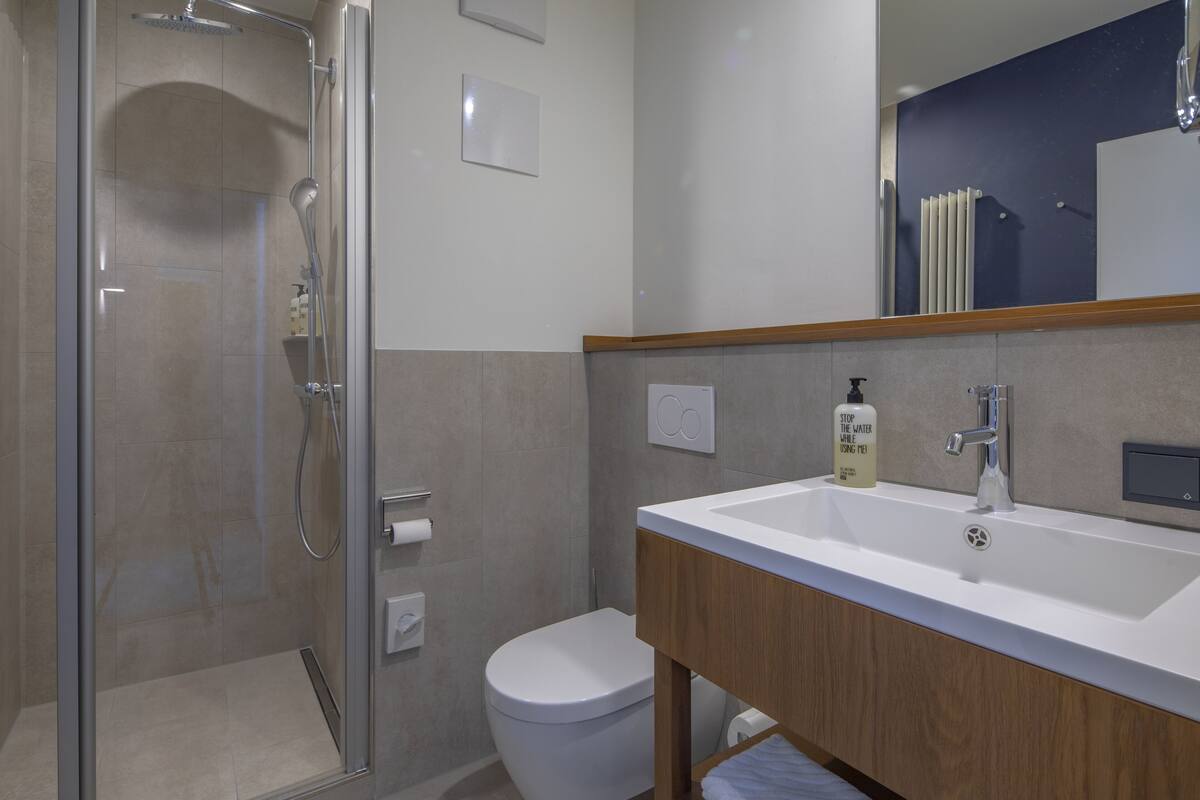 double room, river view | bathroom | eco-friendly toiletries, hair dryer, towels