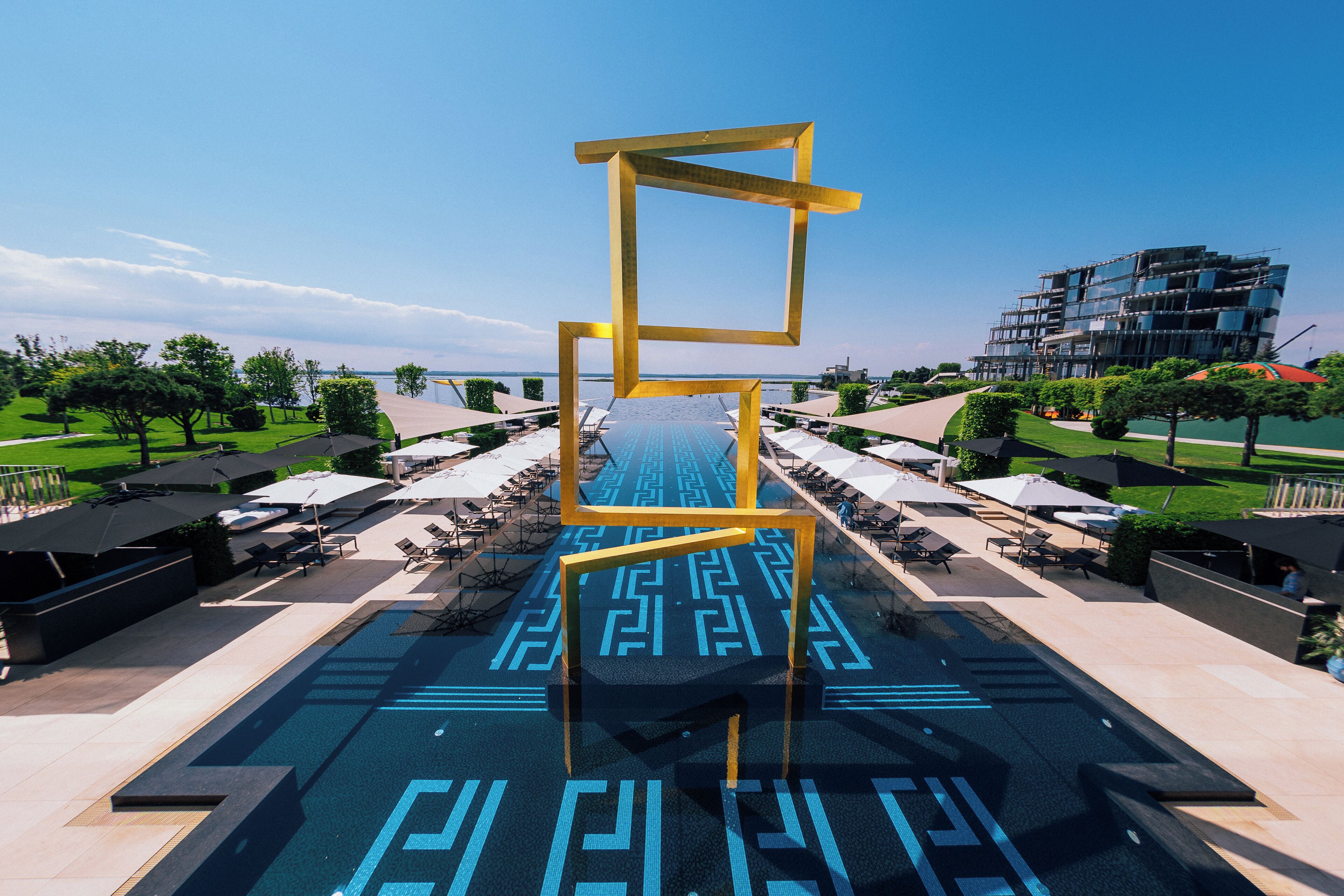 Indoor pool, seasonal outdoor pool, pool umbrellas, sun loungers