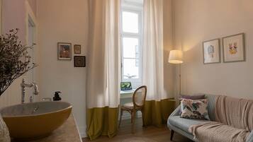 Classic Double Room | Living area | 28-cm flat-screen TV with cable channels, TV