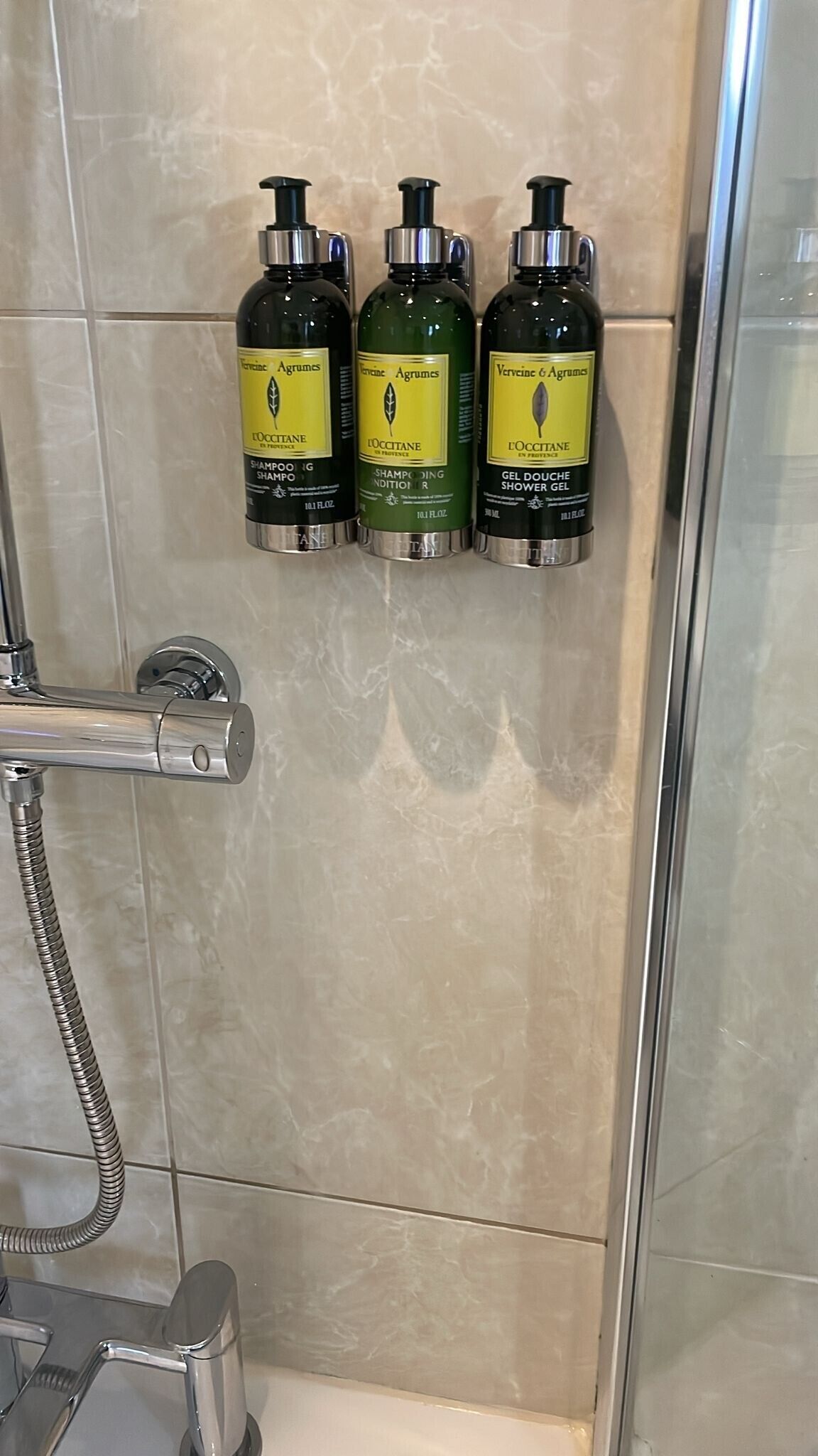 designer toiletries, hair dryer, bathrobes, towels