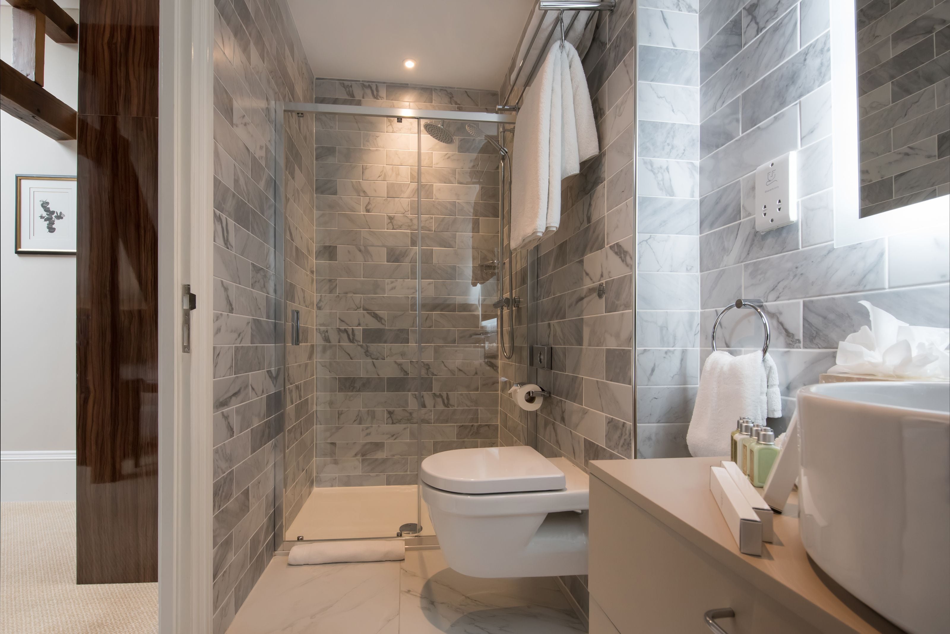 loft (sky view) | bathroom | designer toiletries, hair dryer, bathrobes, towels